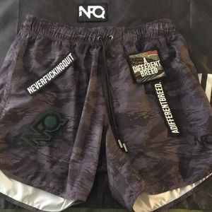 NFQ DARK TS SHORTS LARGE (USED) $20